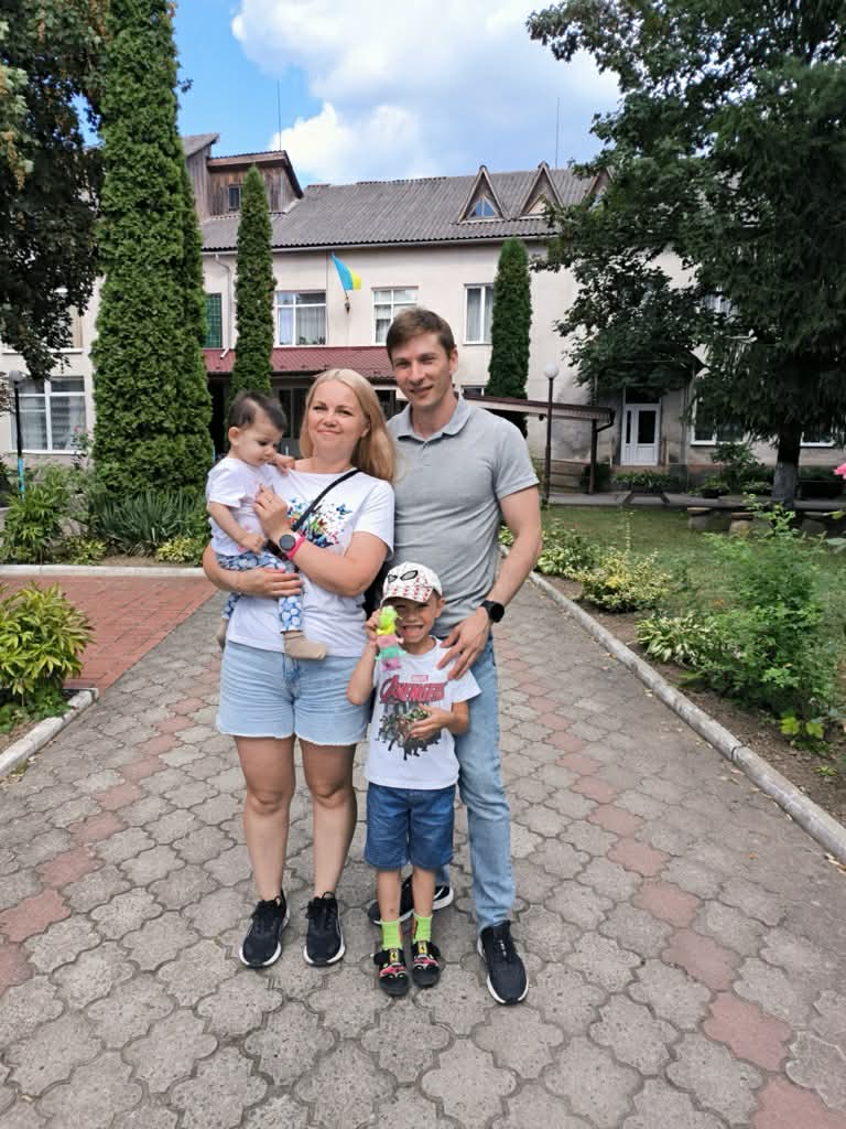 Родина з двома усиновленими дітьми