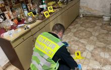 Криміналісти працюють на місці вбивства жінки 